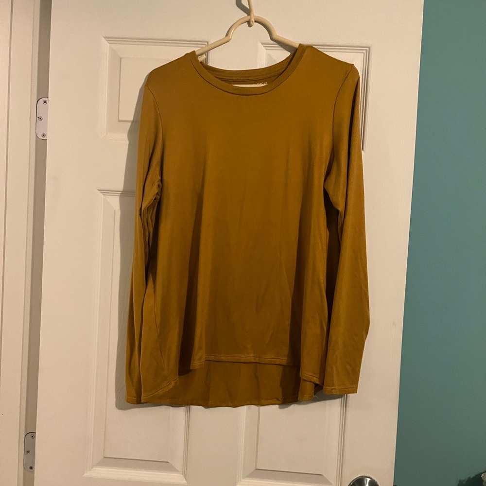 Mustard yellow size large American eagle shirt.
